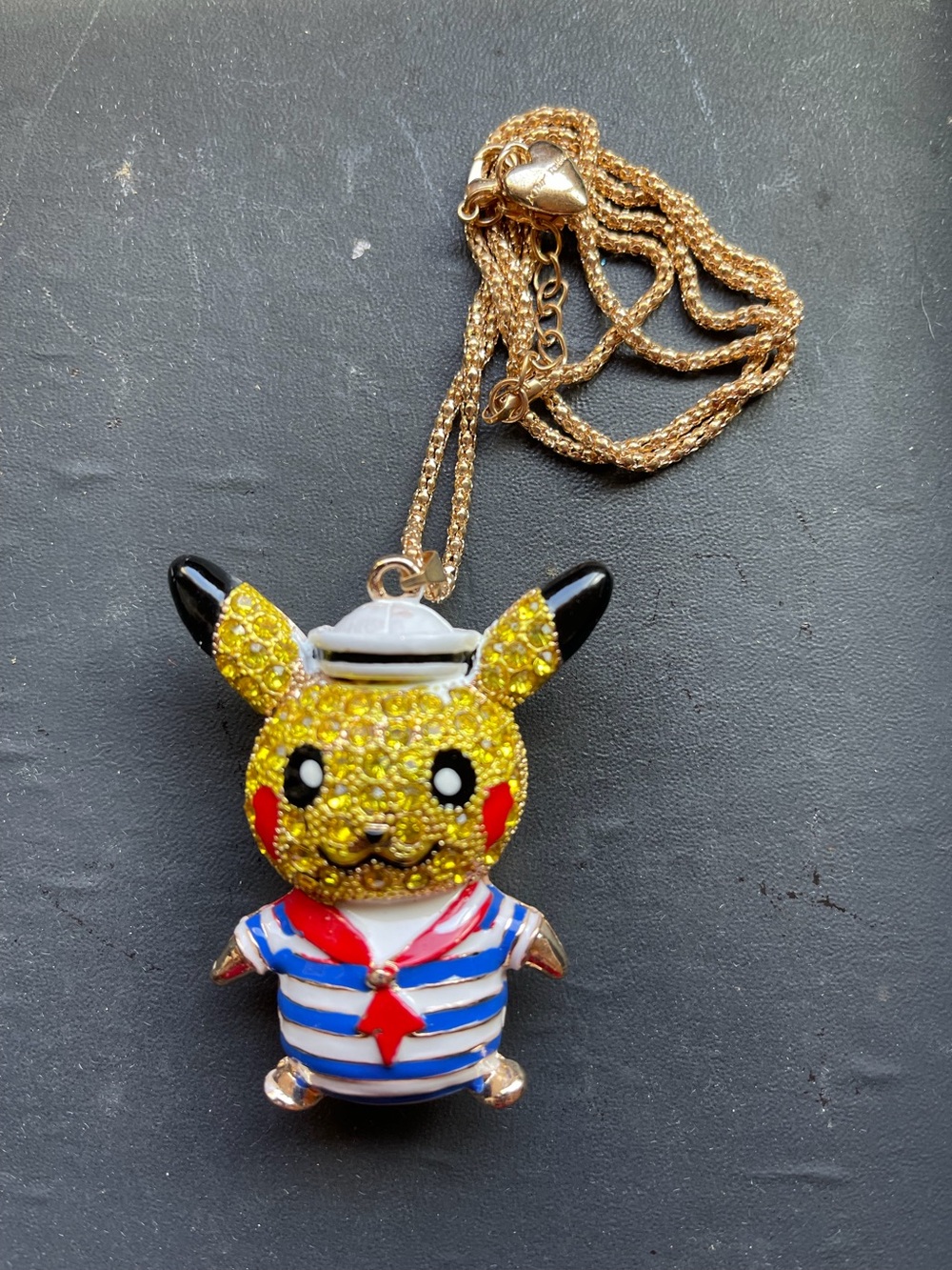 Pikachu Sailor Pendant Necklace - Yellow, Red, Blue enamel shirt and hat 
NWOT